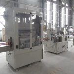 Automatinė kampinio kakliuko butelio pildymo kamštelio linija, skirta koroziniam skysčiui