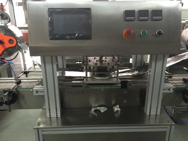 stiklainių sandarinimo mašina.jpg