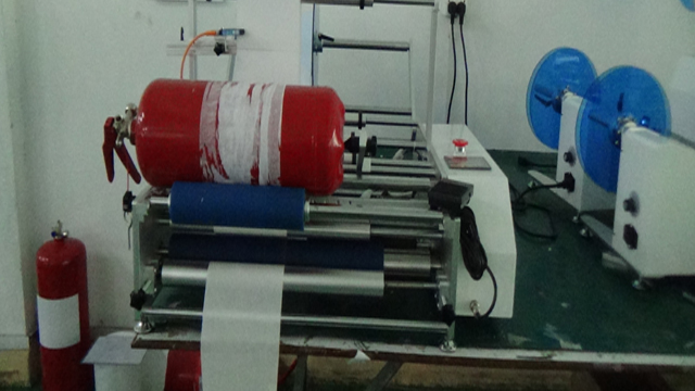 Gaisro gesinimo gaminių ženklinimo įranga.