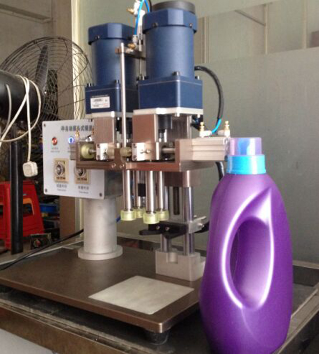 clear pictures for screw capping machinery CREW CAPPER machinery.jpg