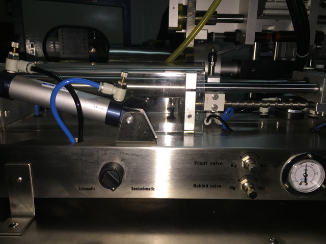 horizontal filling machine for filling process horizontalaus vamzdelių pildymo mašina filler sealer.jpg