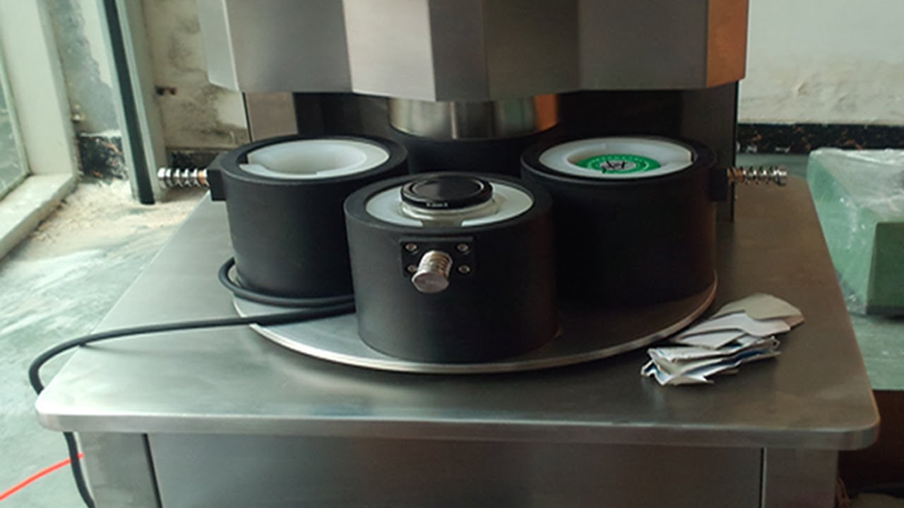 four heads vacuum capping machine semi automatic vakuuminis dangtelis manual.jpg